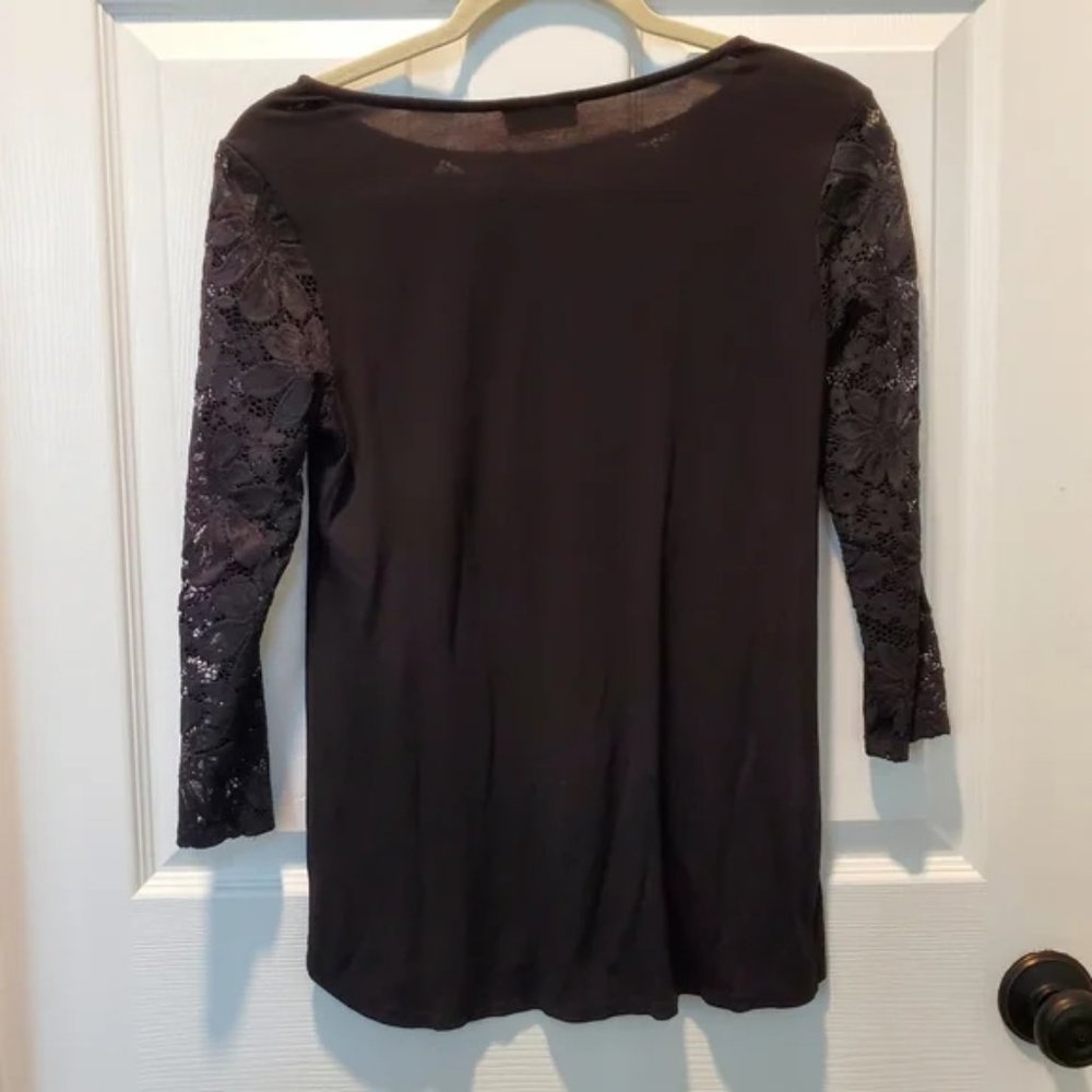 Black long sleeved top with lace details